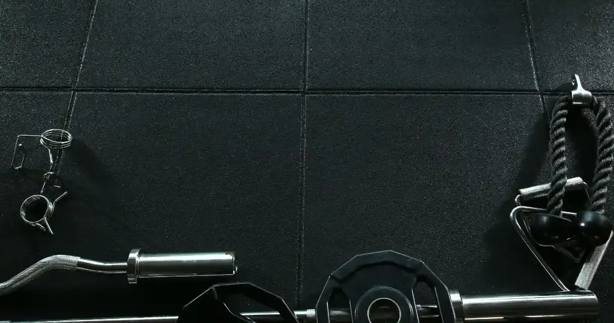 Strength-training area fitted with rubber gym flooring tiles